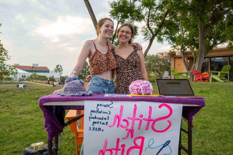 Students at the stich club table